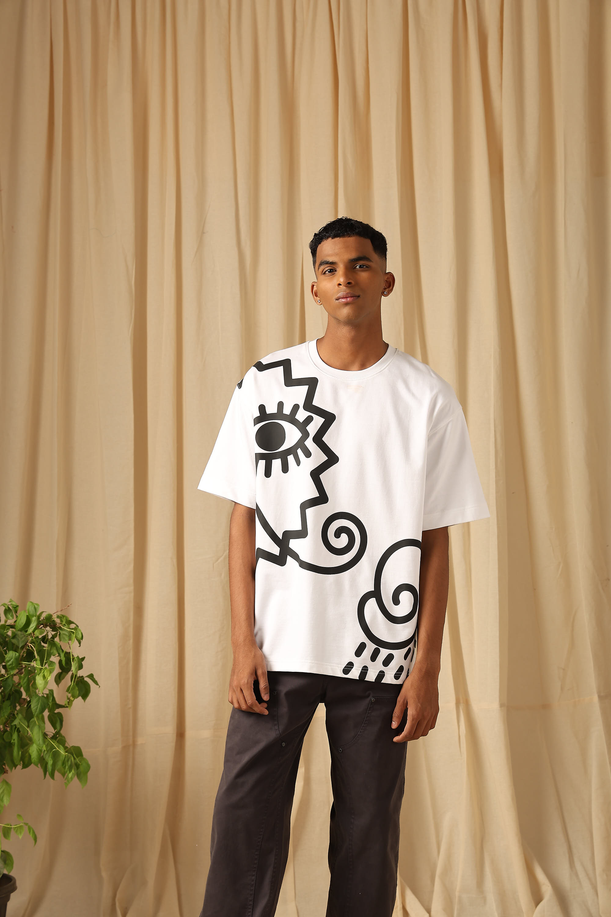 Buy White Printed Oversized Loose Fit Jersey Tee Online at Muftijeans