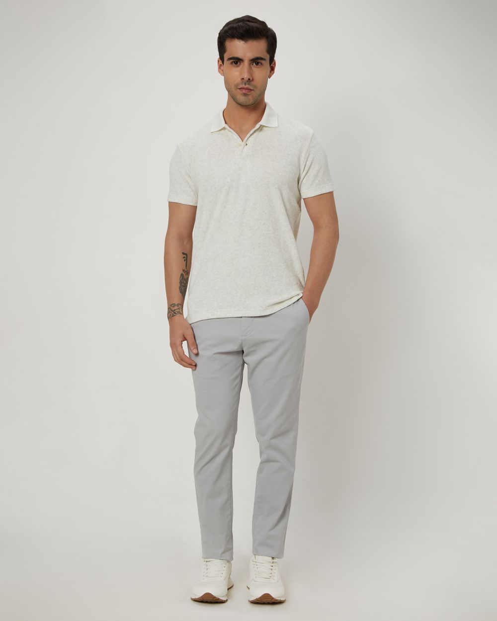 White polo gray pants 2025
